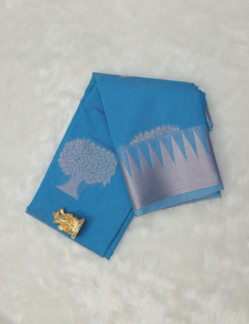 Sky Blue Silk Cotton Saree with Silver Zari Tree Butta and Contrast Pink Pallu